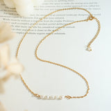 Fleur Pearl Necklace in Gold